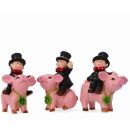 Schweine Figuren mit Schornsteinfeger. 12 Stück
